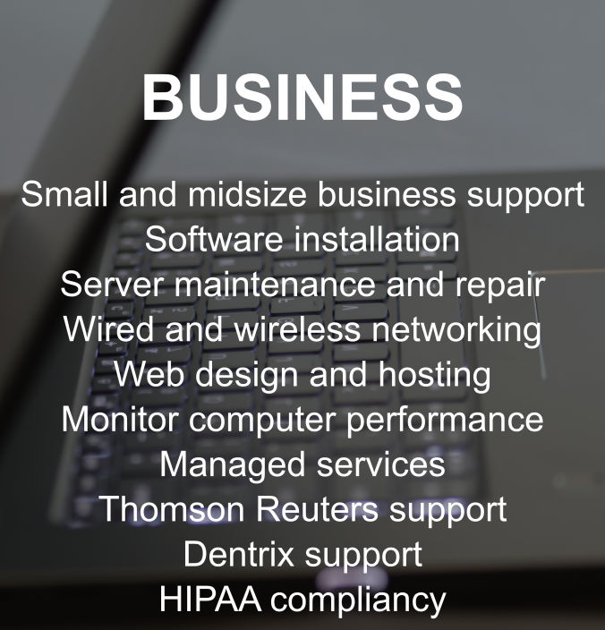An open laptop with glowing keyboard listing business support options and managed services